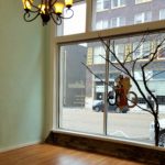 empty room with chandelier and hardwood floor - about Cat's Balllroom studio