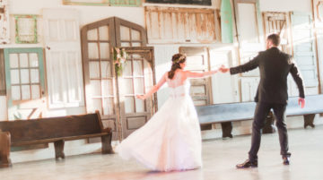 couple striking a pose during their first dance after taking lessons