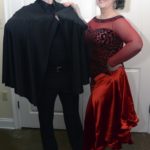 man in zorro outfit with woman in red dress - about Cat's Ballroom performances