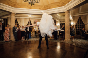 A fun disco lift in Rachel & Perry's first dance