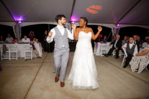 couple walking forward side by side during first dance