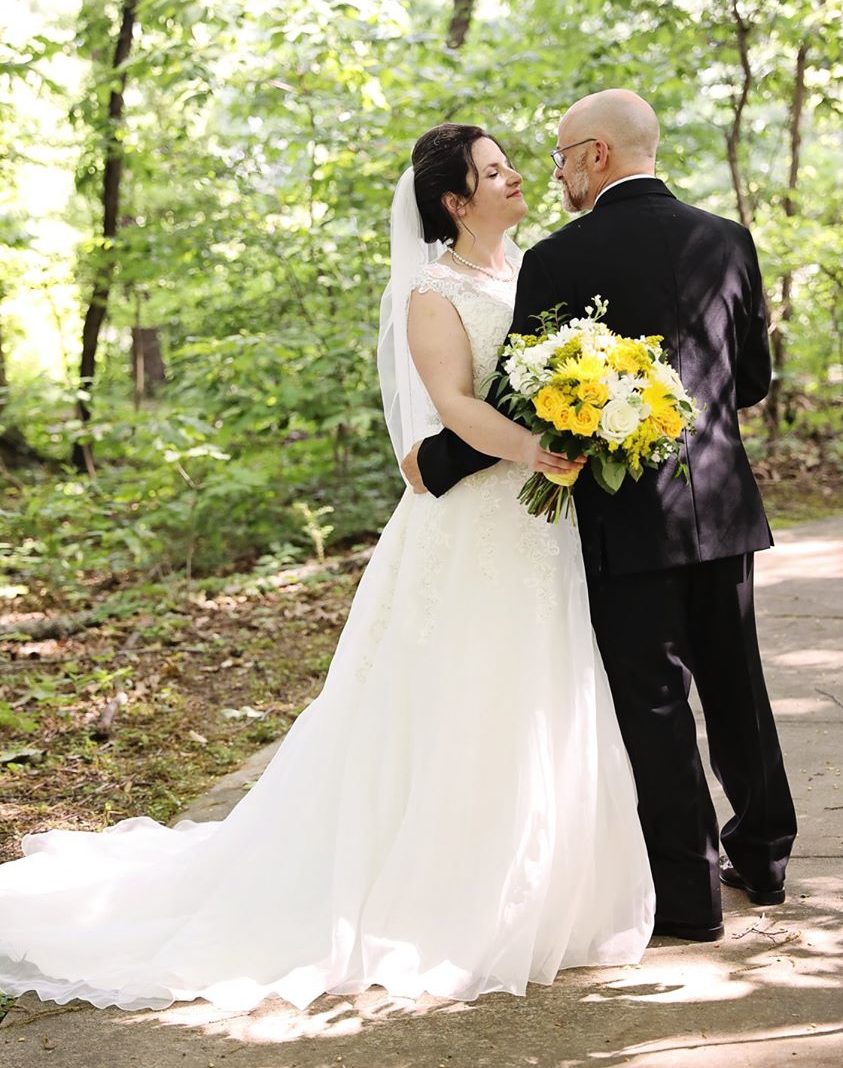 bride and groom in an embrace