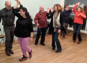 6 people dancing in a group class - one of the options for dance lessons