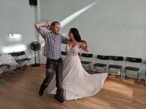 Couple practicing their first dance choreography at Cat's Ballroom.