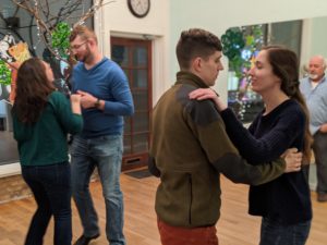 2 couples dancing at a practice party