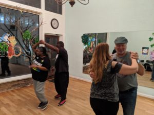 Group dance class with two couples.