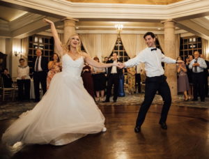 Couple posing dramatically during first dance.