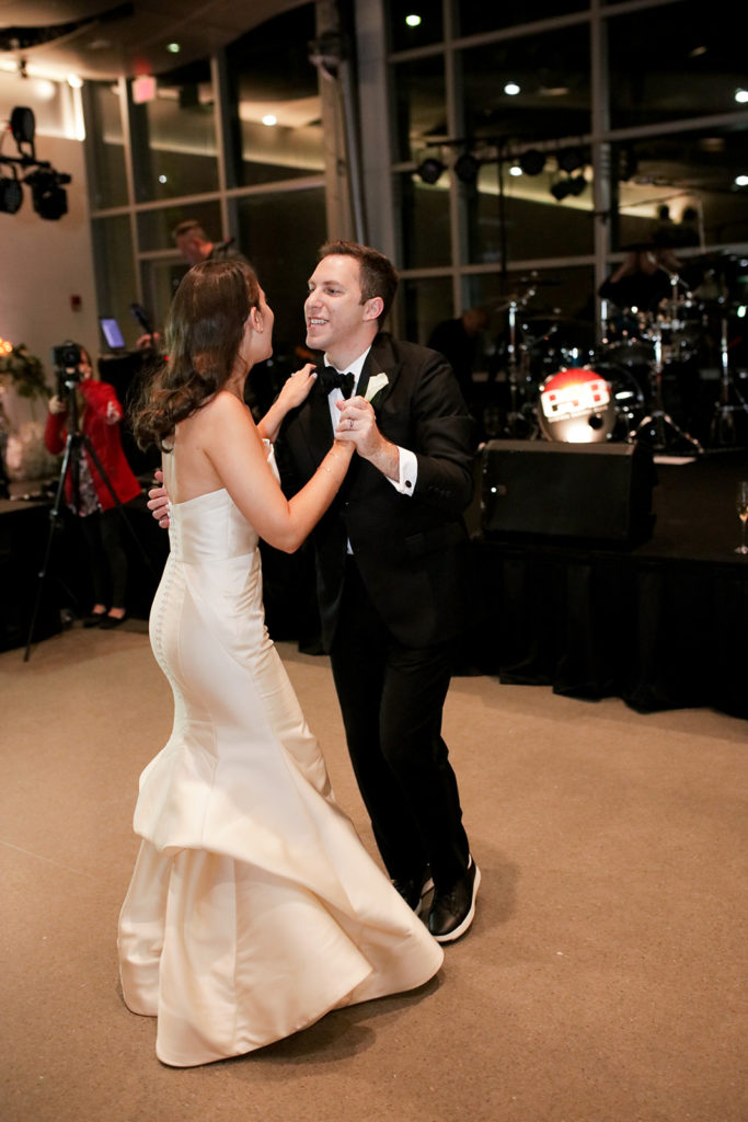 Hayley & Max's first dance - couple dancing at wedding in gown and tuxedo