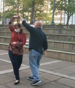 Couple dancing a turn at downtown memphis couples class