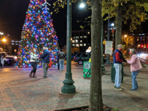 three couples Rockin’ Around the Christmas Tree