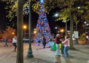 four couples Rockin’ Around the Christmas Tree