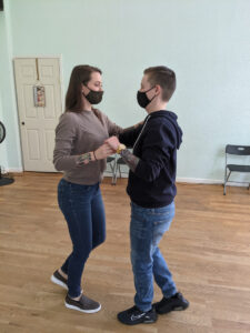 couple taking wedding dance lessons