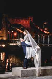 groom lifting bride