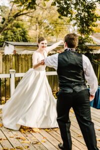 Man swirling woman during first dance