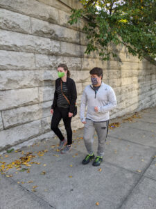 Couple practicing Latin motion on a hill.