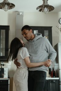 couple dancing in kitchen