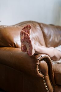 soles of feet with glitter from dancing