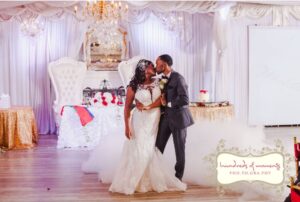 Carla and Loray issing in an oblique line during their first dance