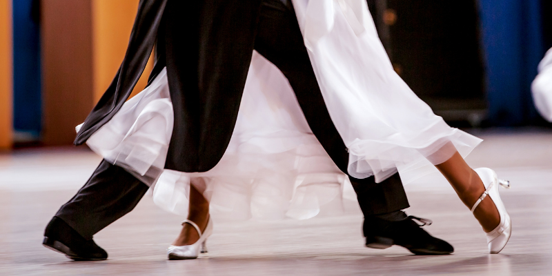 Smooth dancers in tux and white gown