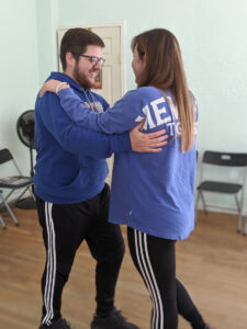 Chesney & Stephen dancing together in practice.