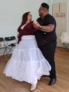 Couple practicing first dance.